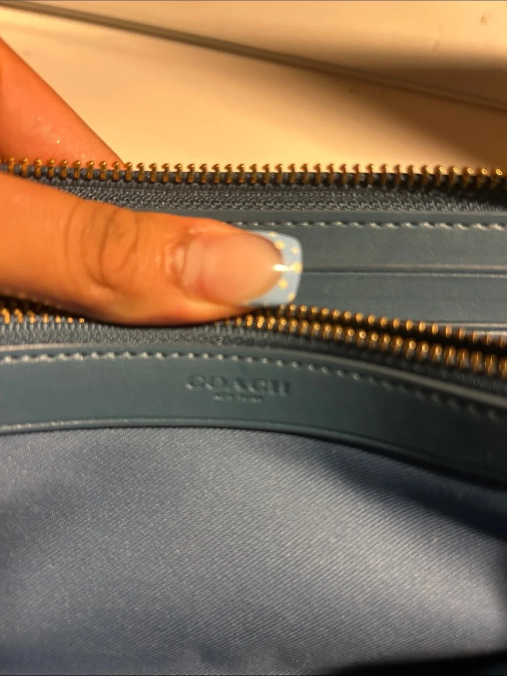 Coach compact zip